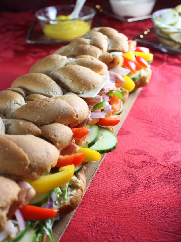 Eye level super long sub sandwich on holiday tablescape