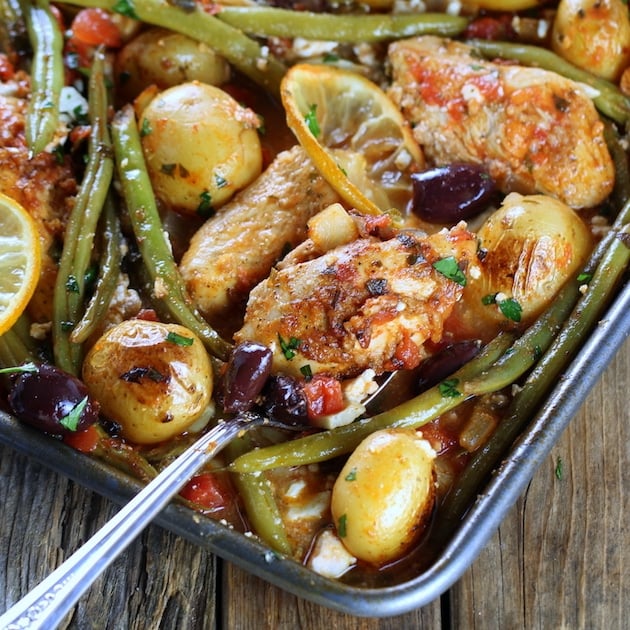 Close up partial Greek Chicken Sheet Pan Dinner with Green Beans and Feta