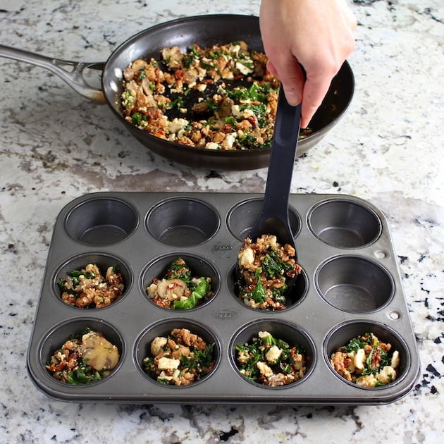 adding ingredients to muffin tin