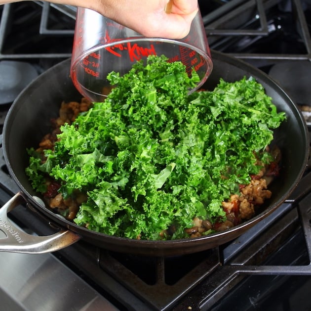 Adding kale to saute pan 