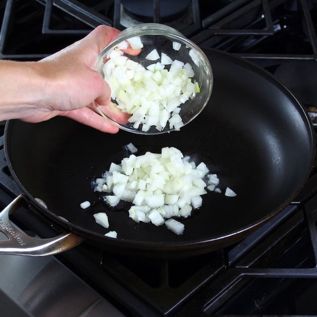 adding onions to saute pan