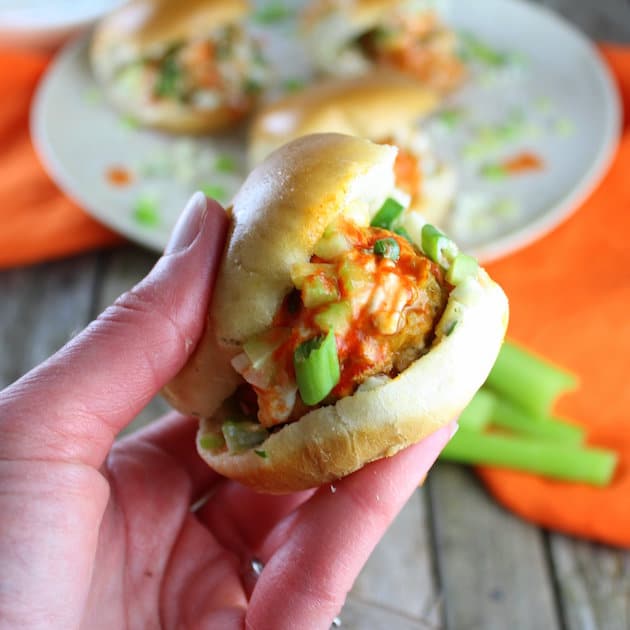 hand holding buffalo chicken meatball slider