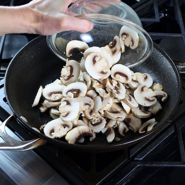 Adding mushrooms to saute pan