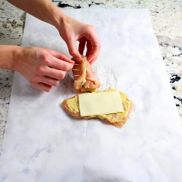 Securing rolled chicken breast with toothpicks