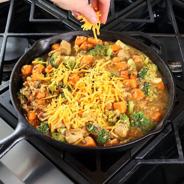 Adding cheddar to Chicken Skillet with Sweet Potatoes and Wild Rice