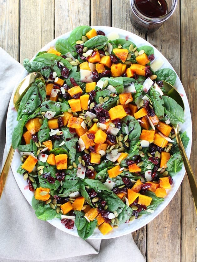 Platter of Roasted Butternut Squash, Cranberry and Spinach Salad with a Cran-Cabernet Dressing
