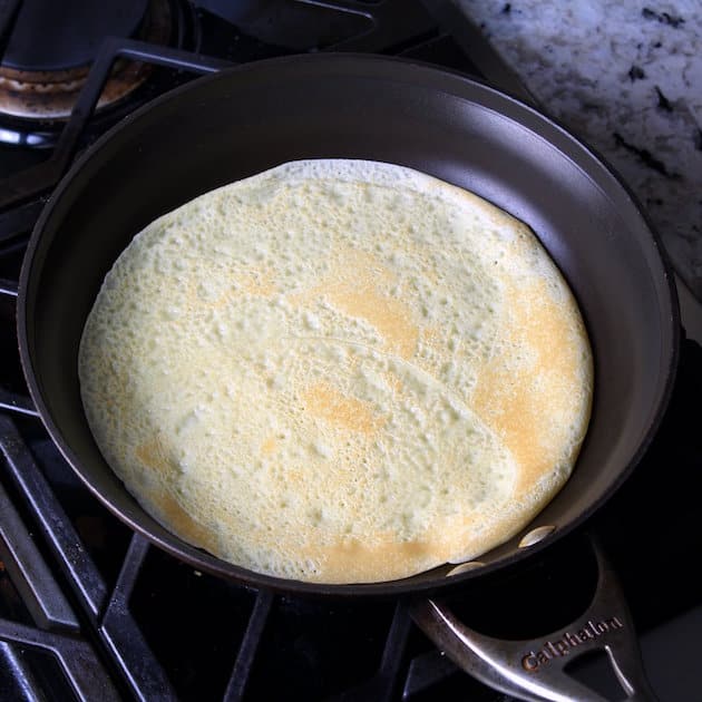 Crepe cooking after being flipped