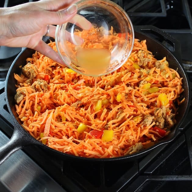 Adding apple cider vinegar to sweet potato breakfast skillet