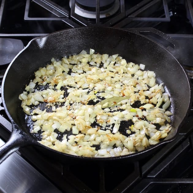 onions sauteeing in skillet