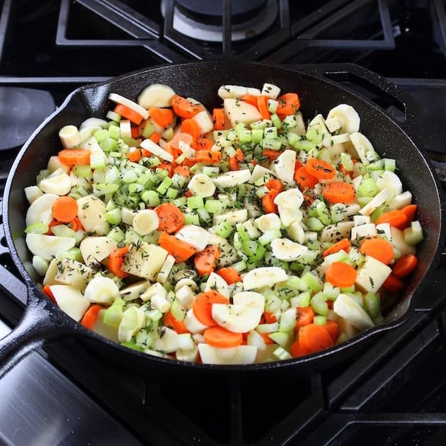 Cottage beef pot pie ingredients in cast iron skillet