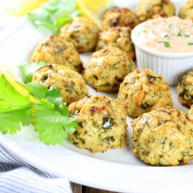 platter of tuna cakes with dipping sauce