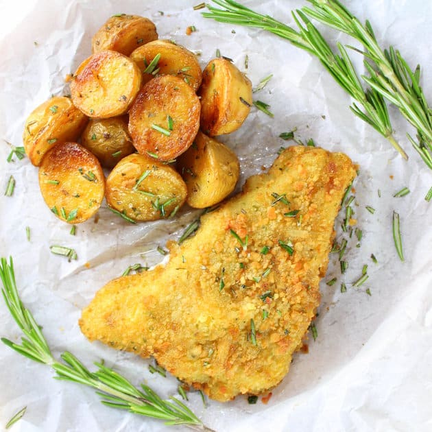 Image Cod Fillets and Salty Potatoes on a parchment paper