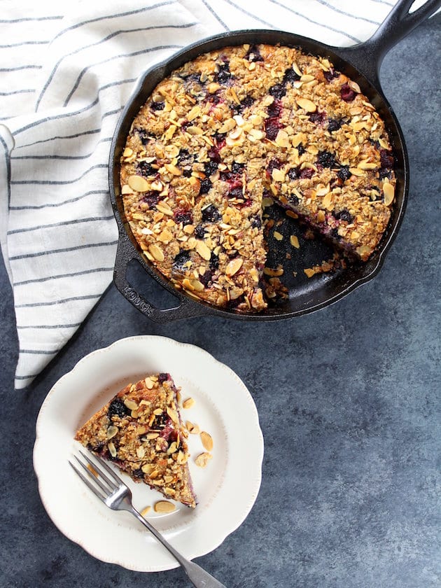 A skillet berry cake sitting on a table