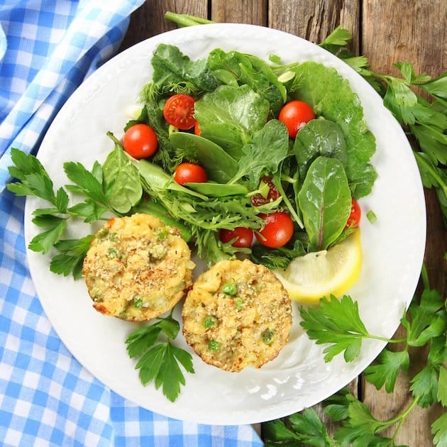 Plate with salad and two tuna casserole muffin cups