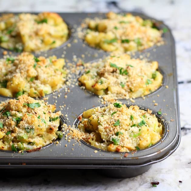 Eye level muffin tin with tuna casserole after baking