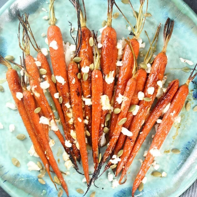 Carrots with goat cheese on a platter