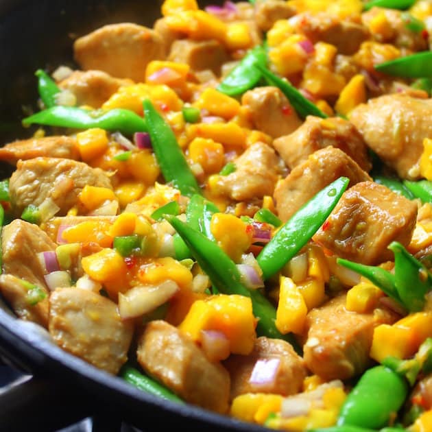 Saute pan with Chicken, Mango, and snap peas