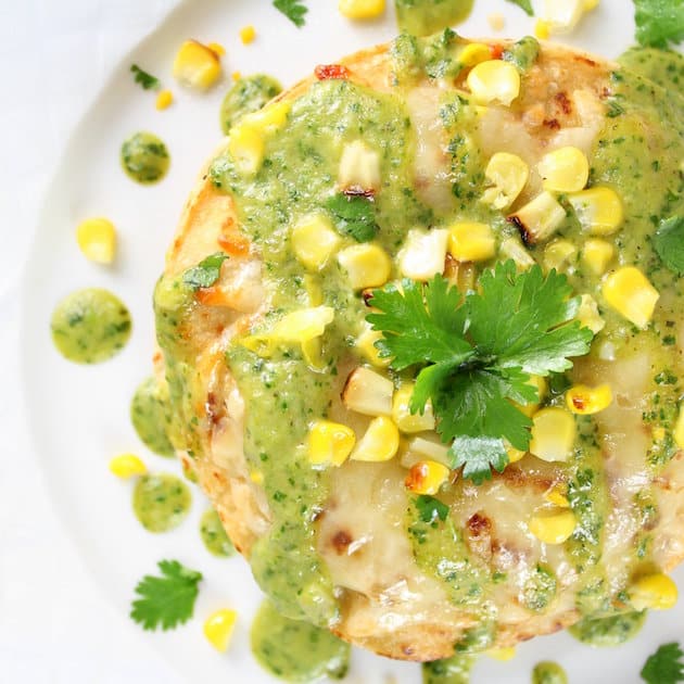 Partial Plate of Stacked Chicken Enchiladas with Cheesy Poblano Green Sauce 