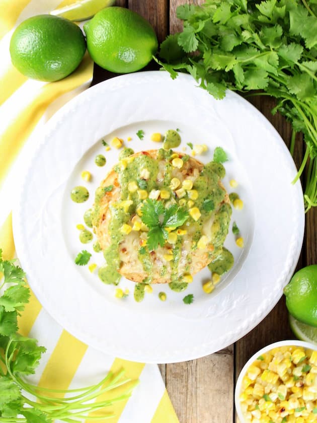 stacked chicken enchiladas with cheesy poblano sauce