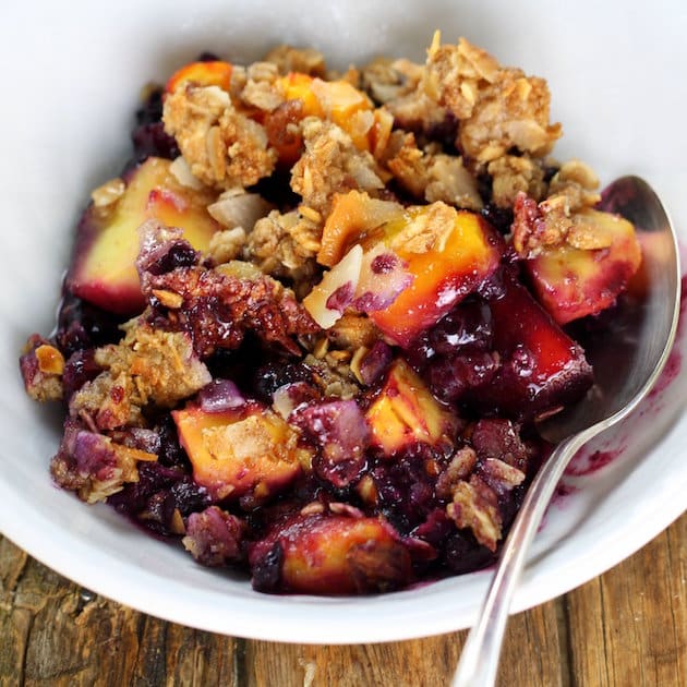 Tropical Blueberry Mango Coconut Crumble in a bowl - An easy fruit dessert