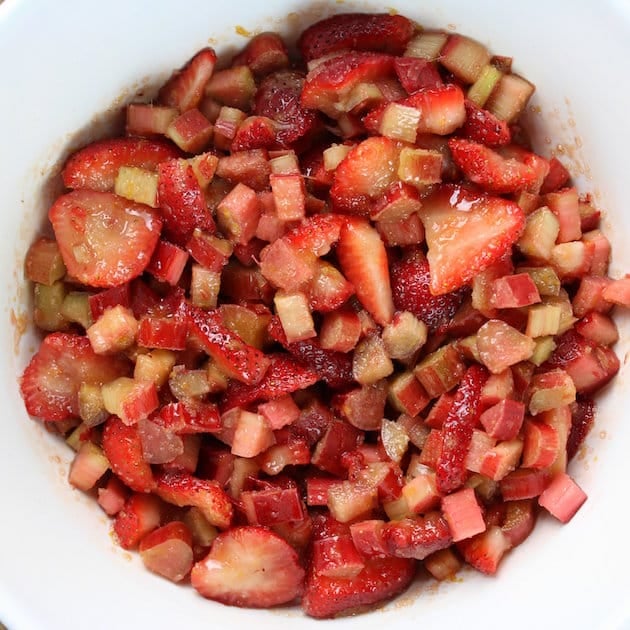 Bowl of diced rhubarb and sliced strawberries
