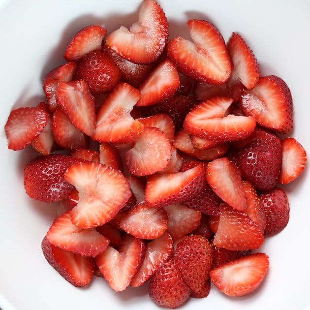 Bowl of sliced strawberries
