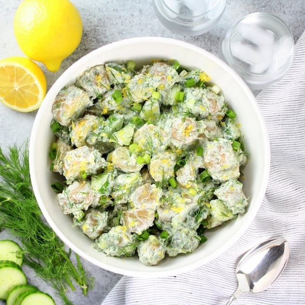 Greek Tzatziki Potato Salad in a white serving bowl