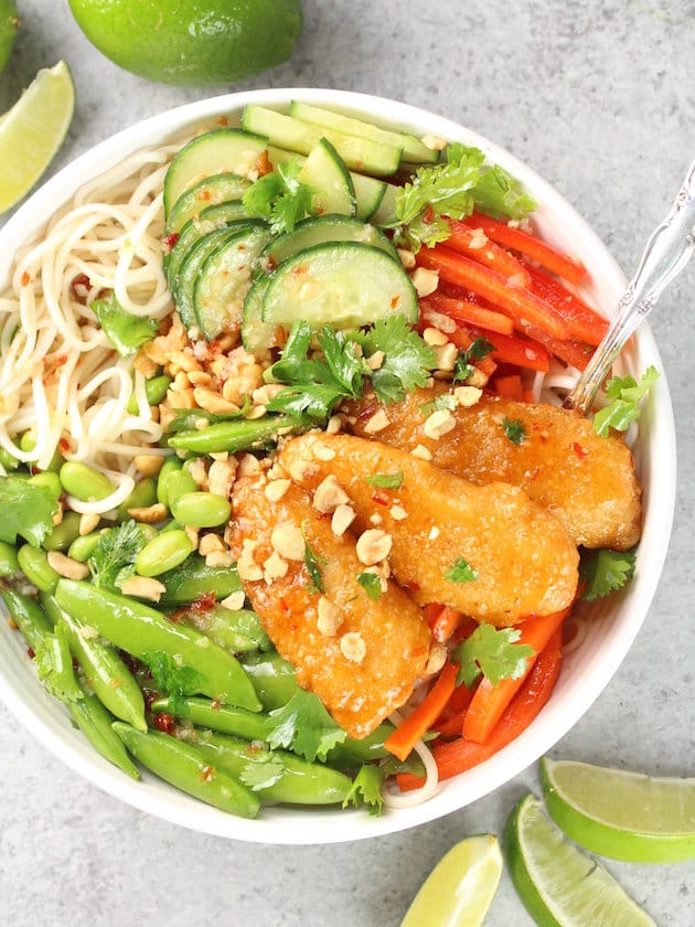 Bowl of fresh veggies with breaded fish tenders and Thai Sweet Chili Sauce