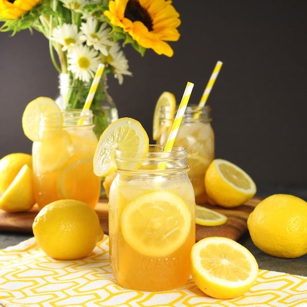 Mason jars with lemonade on table 