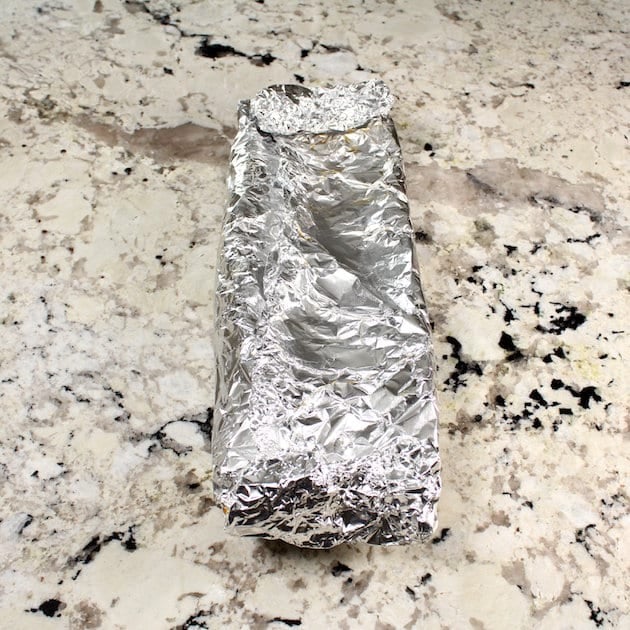How to wrap ribs in foil to cook in the oven.
