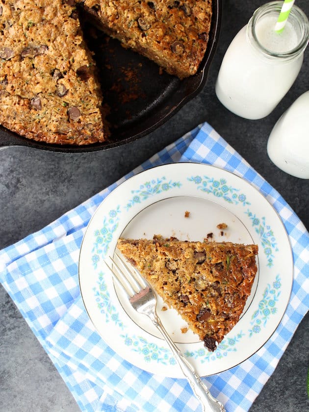 Piece of Chocolate chip zucchini cake on a plate