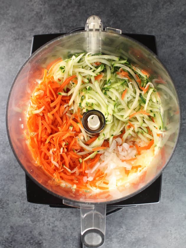 Shredded vegetables in food processor