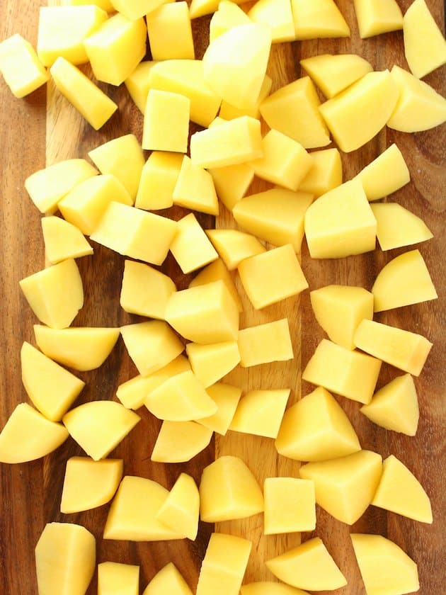 Diced Yukon Golds Potatoes on cutting board 