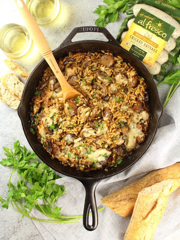 Marsala Chicken Orzo Skillet with wooden spoon