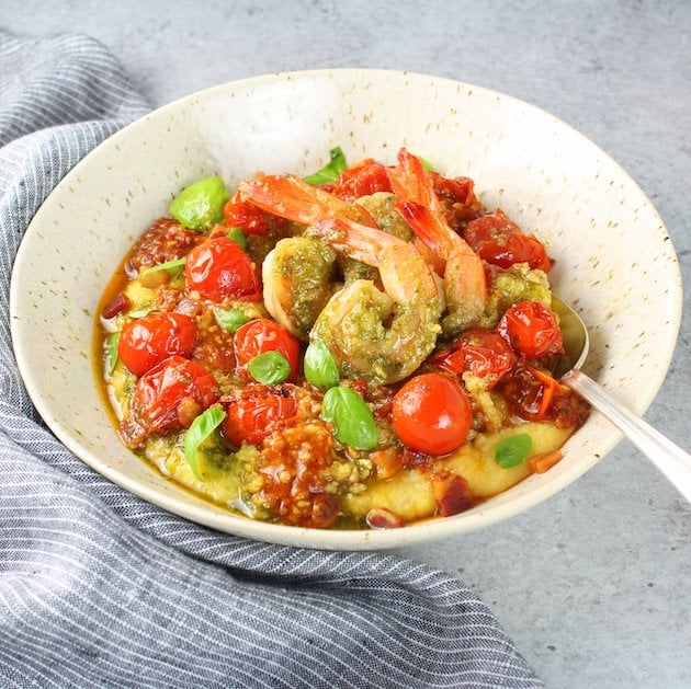 Pesto Shrimp With Parmesan Polenta in a bowl
