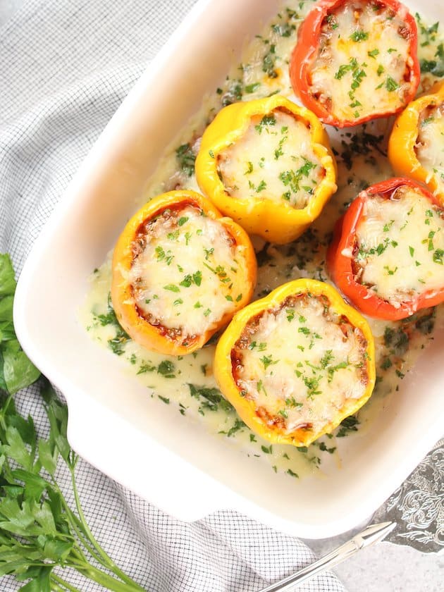 A baking dish with cooked stuffed peppers.