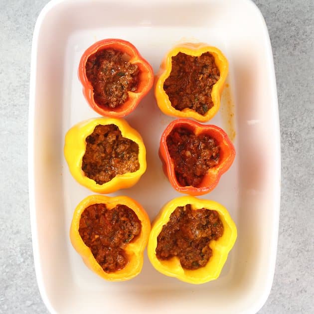 Loading ingredients into stuffed peppers