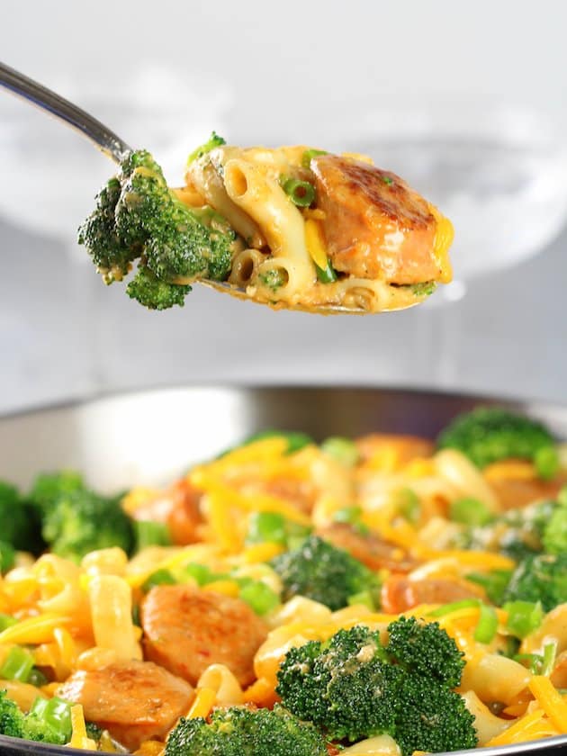 Spoonful of Buffalo Chicken Broccoli Mac and Cheese over pan