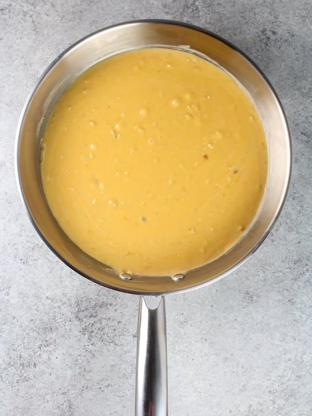 Cheesy sauce in pan