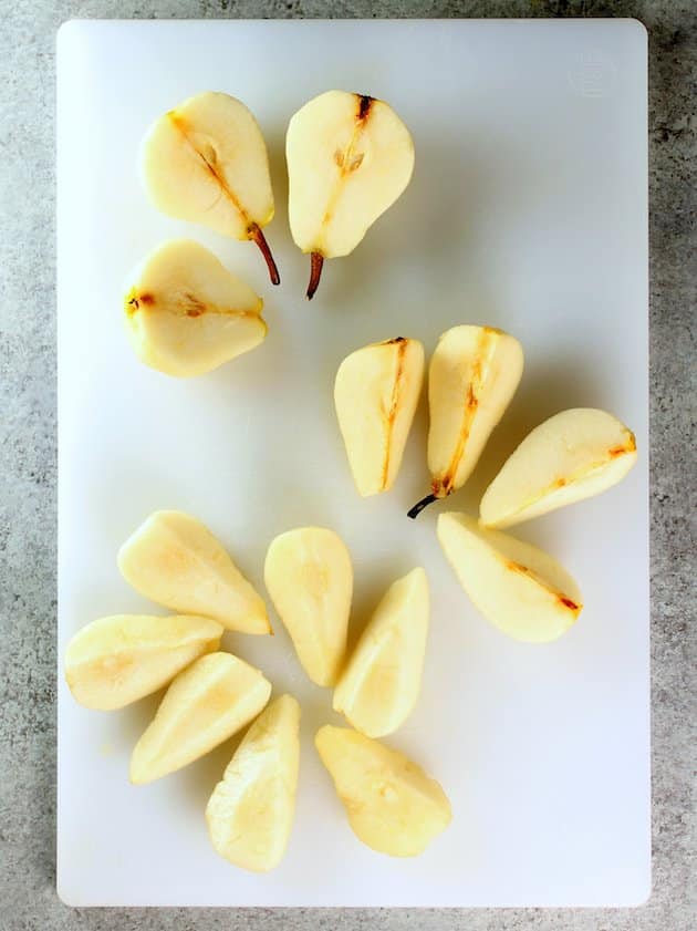 Pear halves on a cutting board