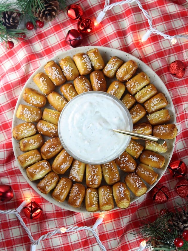 Platter of pretzels with cheesy dip