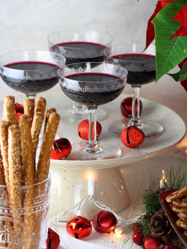 Four wine glasses on holiday tablescape