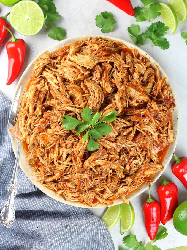 Shredded Mexican Chicken (Instant Pot + Slow Cooker) Full Plate of Chicken Over Top