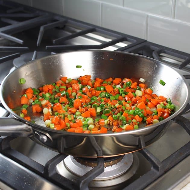 Carrots & Onions cooking in saucepan