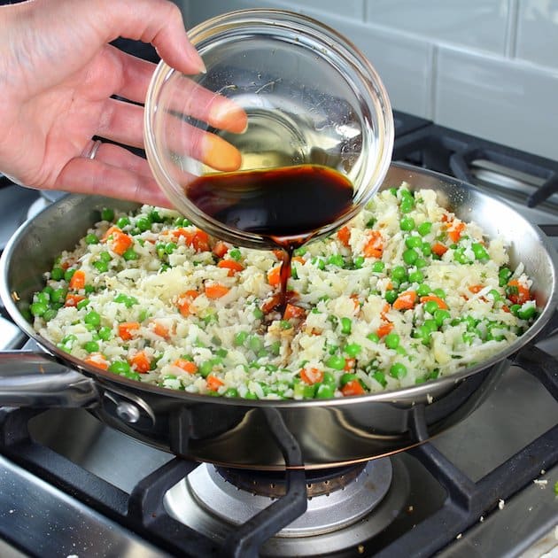 Tamari pouring into saucepan