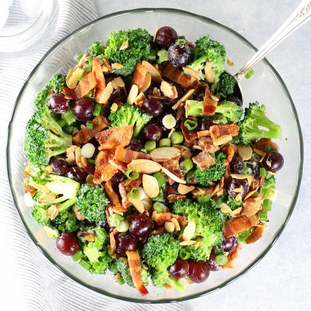 Broccoli Bacon Grape salad in a glass bowl