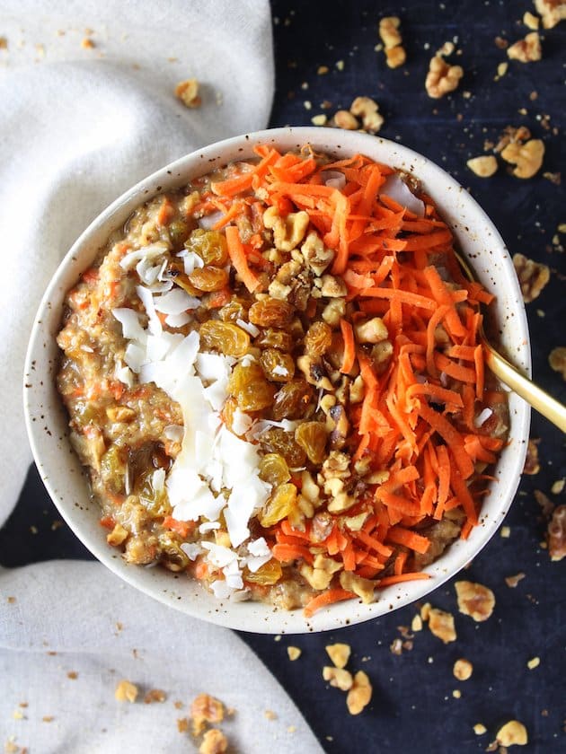 Breakfast bowl with carrots, oats, nuts, coconut