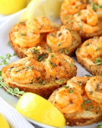 A dish is filled with food, with Shrimp and Toast