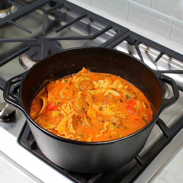 Chicken Sausage Lasagna Soup Cooking in large pot on stovetop