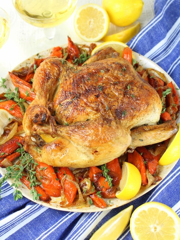 Lemon Thyme Oven Roasted Chicken Recipe &amp; Image: Whole roasted Chicken on Platter